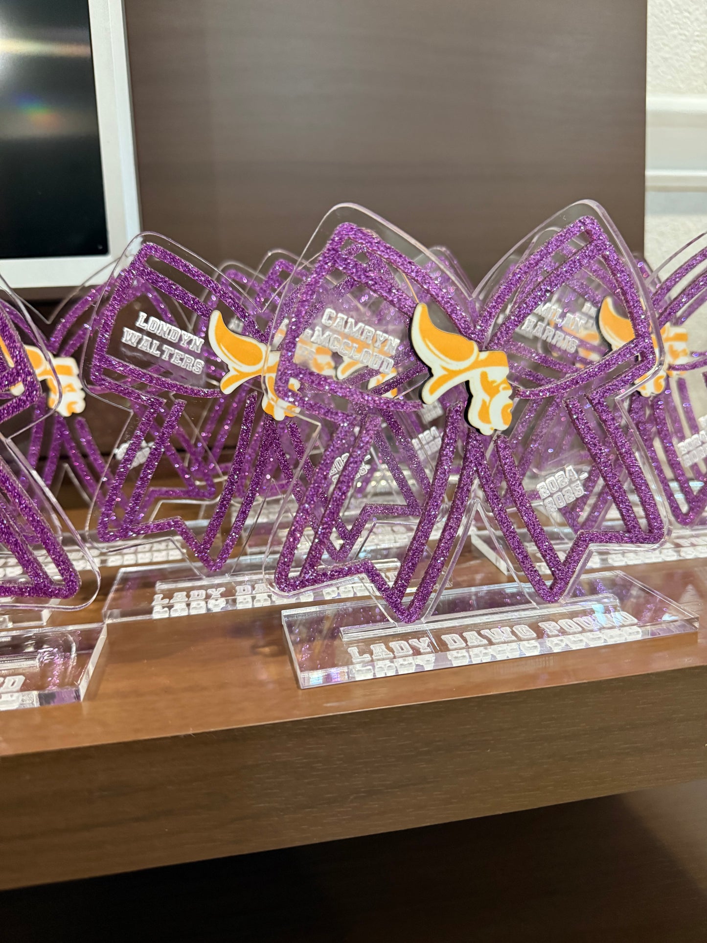 Full color acrylic cheer bow award with team logo